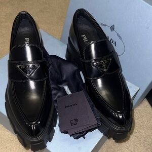 Prada Black Patent Leather Lug-Sole Penny Loafers